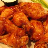 Jumbo Wings · Deep-fried and tossed in 1 of our signature wing sauces.
