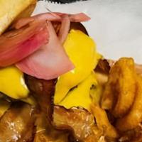 South Side Smashburger · 2 smashed burgers, bacon, pickled red onion, American cheese, station sauce.