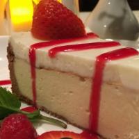 Double Layered Cheesecake · Creamy cheesecake with a second layer of a sour cream topping