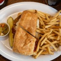 Chicago Style Breaded Steak Sandwich Breaded Steak Sandwich · Breaded Steak Sandwich served on pressed french bread with mozzarella, marinara sauce and gi...