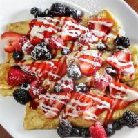 Holly Berry · French toast smothered with strawberries, blueberries, and raspberries
