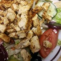 Greek Salad · Iceberg lettuce, fresh cucumbers, tomato wedges, slices of onion, beets, black olives, peppe...