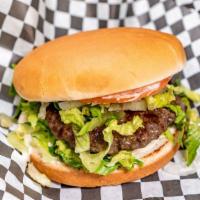 Tia'S Burger · 5 oz seasoned hamburger, Tia’s sauce, lettuce, tomato, and onion.