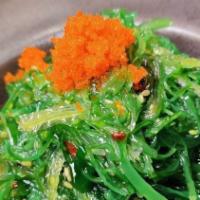 Seaweed Salad · Seaweed salad topped with masago.