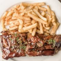 Spare Ribs · half-rack of ribs / tangy BBQ sauce / choice of side
