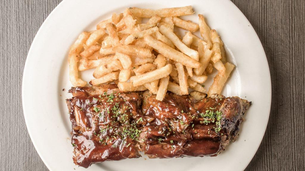 Spare Ribs · half-rack of ribs / tangy BBQ sauce / choice of side