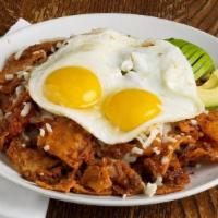 *Red Chilaquiles · Tortilla chips cooked in red salsa topped with avocado, queso fresco and two eggs any style....