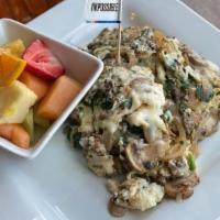 *Impossible Power Scrambler · Three egg whites scrambled with plant-based sausage, spinach, mushrooms, grilled onions, and...