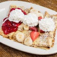 *Rise N Dine Crepes · Crepes filled with strawberries, bananas, pecans and topped with glazed strawberries and whi...