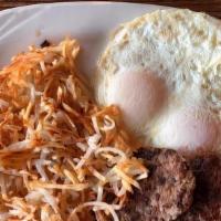 *Two Eggs W/Meat · Two fresh farm eggs cooked any style. Choice of meat and served with Hash-browns or fruit, t...