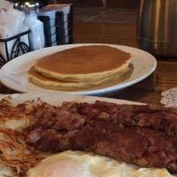 Corned Beef Hash And Eggs · Two fresh farm eggs cooked any style, corned beef hash and served with Hash-browns or fruit,...