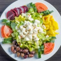 Greek Salad · Lettuce, tomatoes, cucumber, beets, pepperoncini, olives, feta cheese, and Greek dressing.