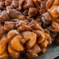 Dozen Premium Donuts · Assortment of 12 of Our Premium Selections (fritters, pinecones, cinnamon Rolls)!