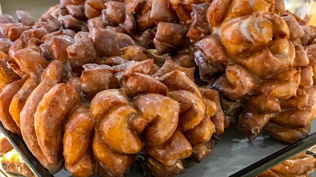 Dozen Premium Donuts · Assortment of 12 of Our Premium Selections (fritters, pinecones, cinnamon Rolls)!