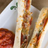(2) Ryan'S Bread Sticks · Bread sticks packed with pepperoni & lots of mozzarella & provolone cheese