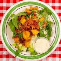 (Lg) Caesar Salad · Fresh romaine, parmesan, real bacon bits, croutons, and caesar dressing