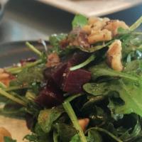 Roasted Beet Salad · Baby arugula, roasted beets, toasted walnuts, herbed goat cheese, with balsamic reduction an...