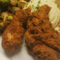 All Natural Fried Chicken · House made fried chicken, white cheddar grits, signature crispy brussels sprouts, with black...