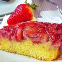 Strawberry Upside-Down Cake · Served warm with house made whipped cream