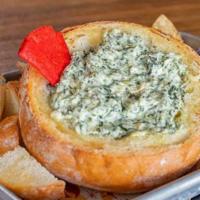 Spinach Artichoke Dip · Gluten-free only when served with corn tortilla chips. A hard to resist starter. Our homemad...