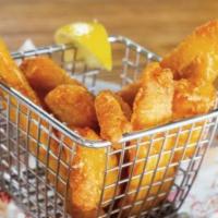 Walleye Fingers · Beer Battered cold water Canadian walleye fingers served with Tartar Sauce.