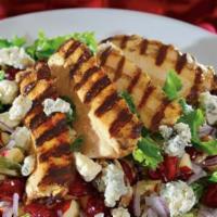 Chopped Wisconsin Harvest · We toss fresh greens, apples, dried cranberries, and red onions topped off with toasted waln...