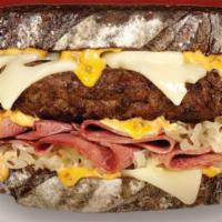 The Brooklyn · Wisconsin Swiss cheese, corned beef, sauerkraut and thousand island dressing on grilled marb...
