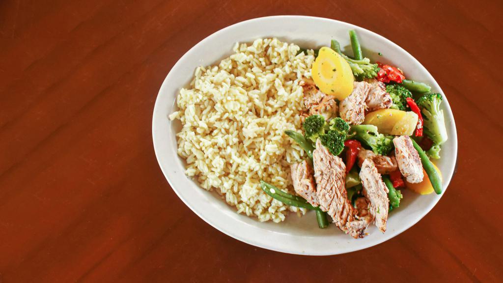 Chicken Stir Fry · All stir fry's are served on a bed of rice with pita bread.