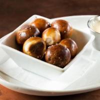 Pretzel Bites · Pretzel salt, beer cheese sauce.