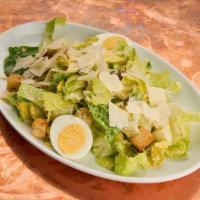 Caesar Salad · Whole romaine leaves, hard-boiled egg, kalamata olives, parmesan, garlic croutons, caesar dr...
