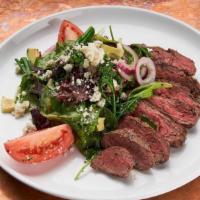 Steak Salad · Grilled top sirloin steak, baby greens, red onion, Roma tomatoes, grilled marinated broccoli...