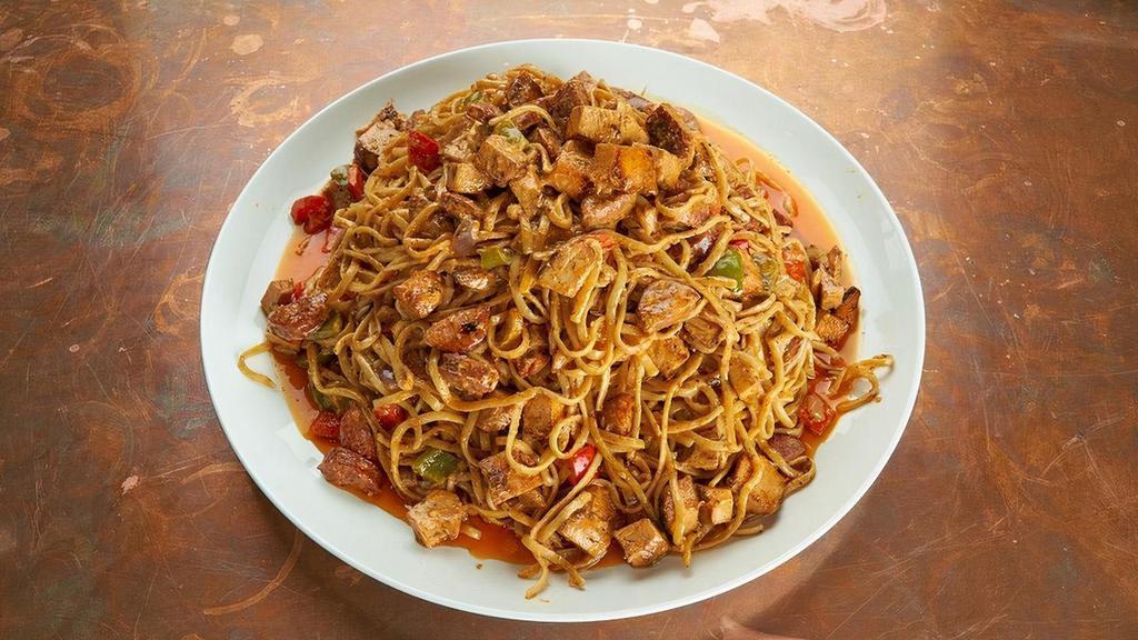Cajun Linguine · Blackened chicken, andouille sausage, bell peppers, red onion, scallions, Sriracha cream, linguine pasta.. Comes with choice of salad.. Carry out only. Serves 4-6.
