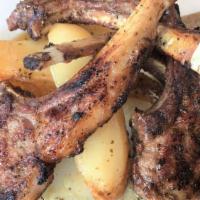 Lamb Chops · Colorado lamb chops served with choice of side.