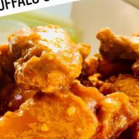 8 Jumbo Wings · Fresh jumbo wings fried and tossed in your choice of sauce. Served with celery and blue chee...