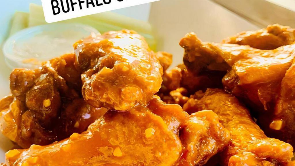 8 Jumbo Wings · Fresh jumbo wings fried and tossed in your choice of sauce. Served with celery and blue cheese dressing.