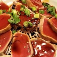 Tuna Tataki · Lightly grilled fresh cuts of tuna.