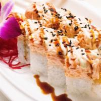 #64. Crazy Roll · Shrimp tempura roll w. spicy crab meat drizzle of 2 kinds of sauce.