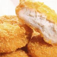 Halal Chicken Nuggets (10 Pieces) · Halal chicken breast nuggets.