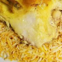 Chicken Biryani · Chopped chicken sautéed with long grain basmati rice with biryani seasoning.