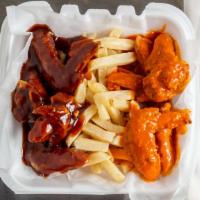 Buffalo Wings · Served with one side. Traditional or boneless.