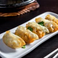 Fried  Chicken  Gyoza (6Pc) · Deep fried dumplings.