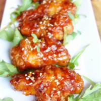 Spicy Garlic Chicken Drums (5Pcs) · 5Korean style chicken drums (and wings)  coated in our homemade savory spicy garlic sauce to...