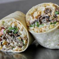 Philly Burrito · Steak, mozzarella cheese, onions, tots, chipotle mayo, lettuce, and tomatoes.