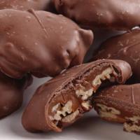Chocolate Pecan Turtles · We start with jumbo, roasted and salted pecan halves and top them with a generous dollop of ...