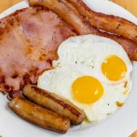 Lumberjack Breakfast · Two eggs, slice of ham, two bacon strips, two sausage links. Choice of toast or pancakes.