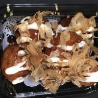 Takoyaki (6) · Fried octopus ball, topped with Japanese mayo, bonito flakes.