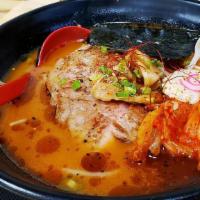 Steak Kimchi Ramen · Spicy tonkotsu broth: Topping with grill steak, spicy kimchi, bean sprouts, bamboo shoot, gr...