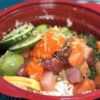 Rainbow Bowl · Salmon, tuna, yellowtail, scallion, masago mix with garlic soy yuzu. seaweed salad, crab sal...