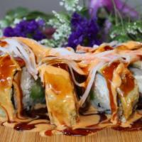 Scarlet Roll · (Tempura Roll & Cooked) Spicy Tuna, avocado, and cream cheese topped with crab meat, spicy m...