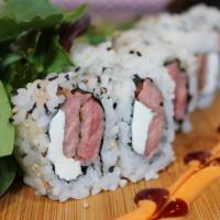 Beef Roll · Seared steak with cream cheese topped with spicy mayo and brown sauce.